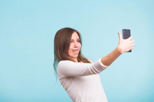 fool crazy woman make selfie. happy expression.