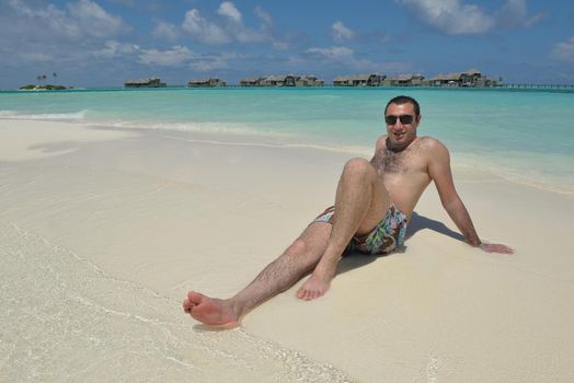 happy young man have fun and relax on beach