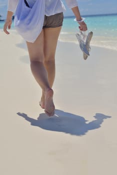 happy young woman on summer vacation on beautiful tropical beach have fun enjoy and relax