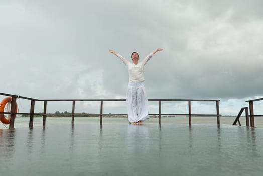 young woman relax on cloudy summer day and bad weather