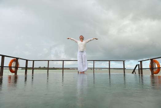 young woman relax on cloudy summer day and bad weather