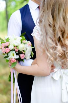 Groom dancing with fiancee. Concept of married couple and love.