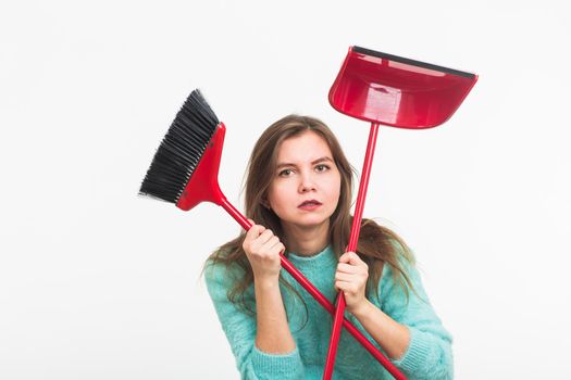 Woman or housewife holding broom, tired to cleaning, on white background, isolated with copy space