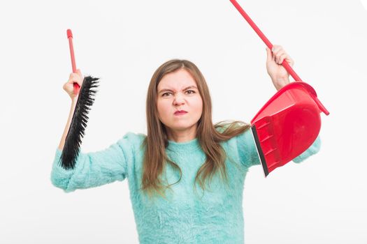 Woman or housewife holding broom, tired to cleaning, on white background, isolated with copy space