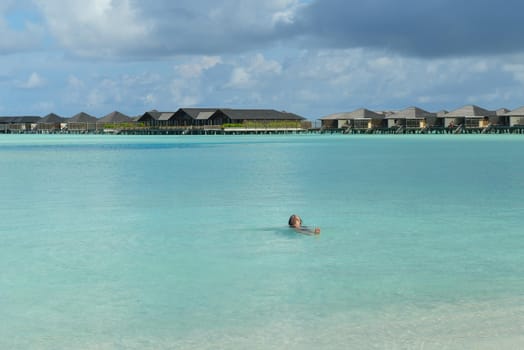 happy young woman on summer vacation on beautiful tropical beach have fun enjoy and relax