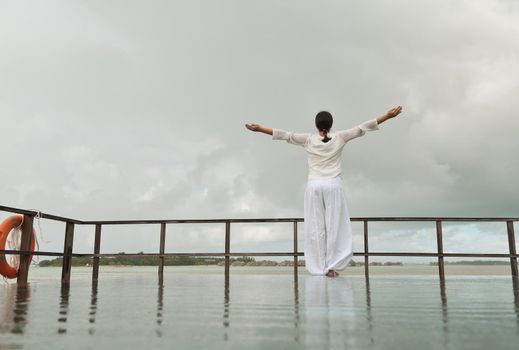 young woman relax on cloudy summer day and bad weather