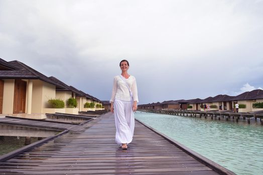 young woman relax on cloudy summer day and bad weather