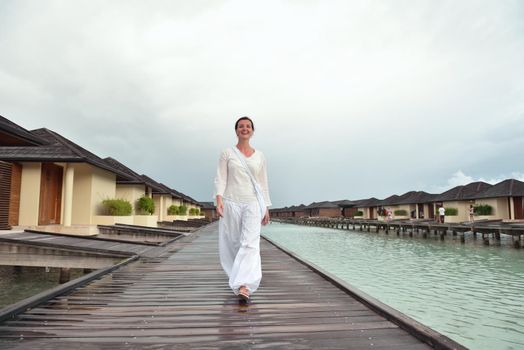 young woman relax on cloudy summer day and bad weather