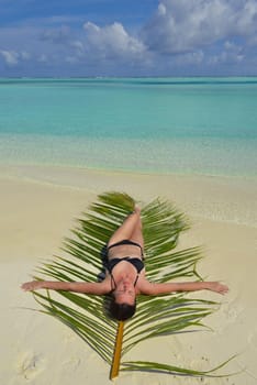 happy young woman on summer vacation on beautiful tropical beach have fun enjoy and relax