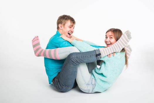 Happy couple having fun and fooling around. Joyful man and woman have nice time. Good relationship and valentines day concept.