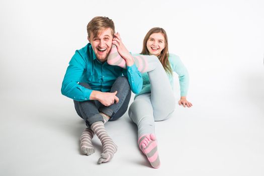 Happy couple having fun and fooling around. Joyful man and woman have nice time. Good relationship and valentines day concept.