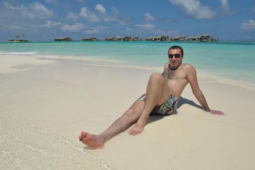 happy young man have fun and relax on beach