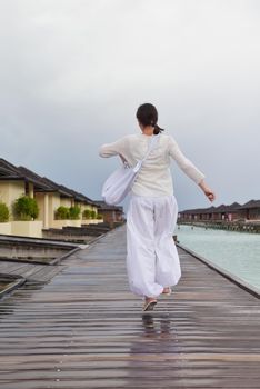 young woman relax on cloudy summer day and bad weather