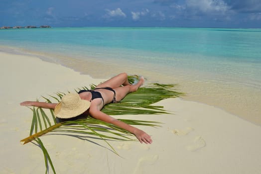 happy young woman on summer vacation on beautiful tropical beach have fun enjoy and relax