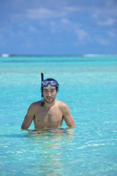 Shirtless young guy with diving mask