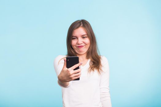 fool crazy woman make selfie. happy expression.