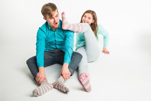 Happy couple having fun and fooling around. Joyful man and woman have nice time. Good relationship and valentines day concept.