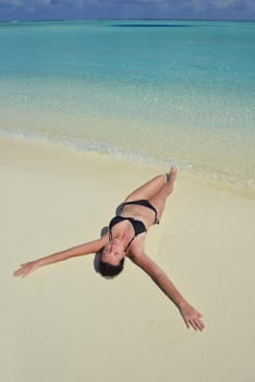 happy young woman on summer vacation on beautiful tropical beach have fun enjoy and relax