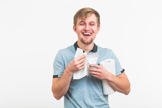 Young man with handkerchief. Sick guy isolated has runny nose