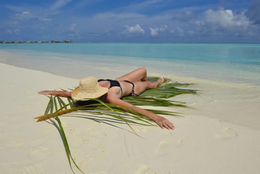 happy young woman on summer vacation on beautiful tropical beach have fun enjoy and relax