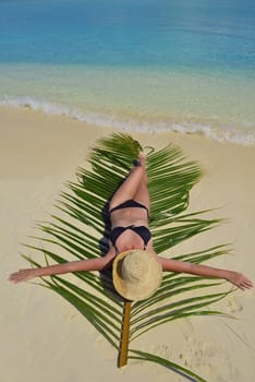 happy young woman on summer vacation on beautiful tropical beach have fun enjoy and relax