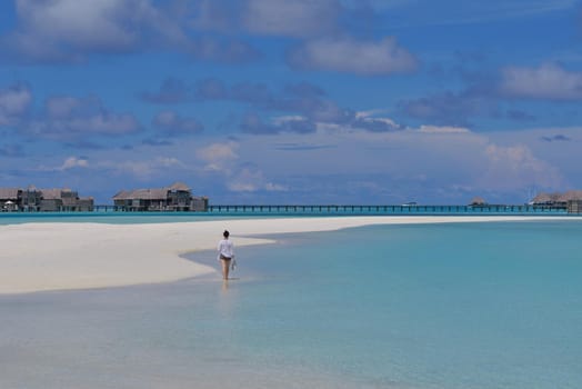 happy young woman on summer vacation on beautiful tropical beach have fun enjoy and relax