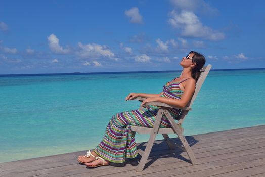 happy young woman on summer vacation on beautiful tropical beach have fun and relax