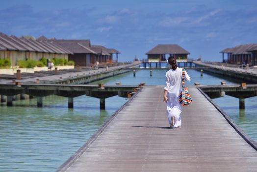 happy young woman on summer vacation on beautiful tropical beach have fun and relax