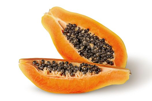 Half and quarter ripe papaya top wiev isolated on white background
