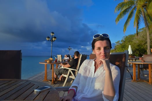 happy young woman on summer vacation on beautiful tropical beach have fun enjoy and relax