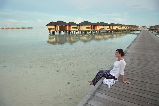 happy young woman on summer vacation on beautiful tropical beach have fun enjoy and relax