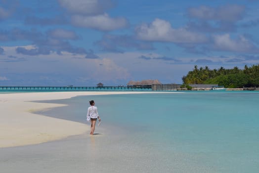 happy young woman on summer vacation on beautiful tropical beach have fun enjoy and relax