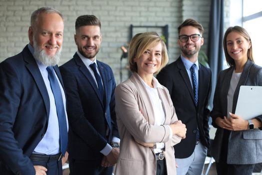 Group of successful business people on the background of the office