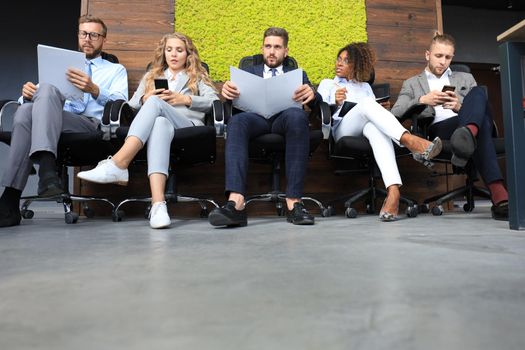 Modern business people waiting for job interview.