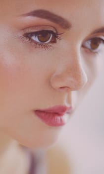 Beauty portrait of female face with natural skin.