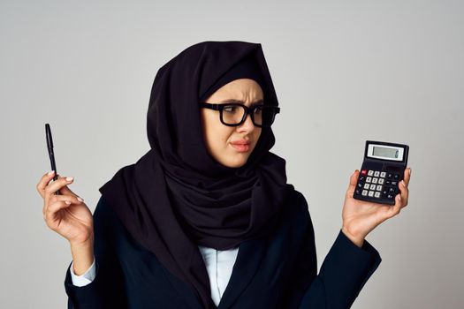 woman in black hijab laptop work technology office. High quality photo