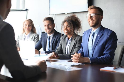 Job interview with the employer, businessman listen to candidate answers