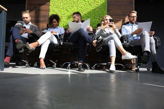 Modern business people waiting for job interview.