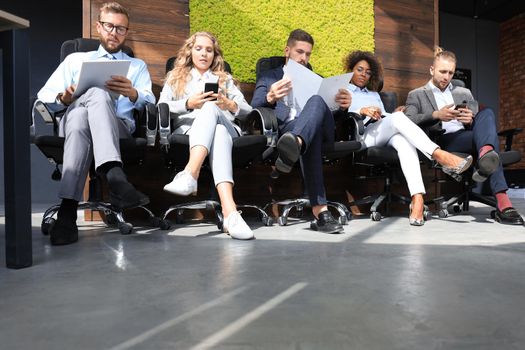 Modern business people waiting for job interview.