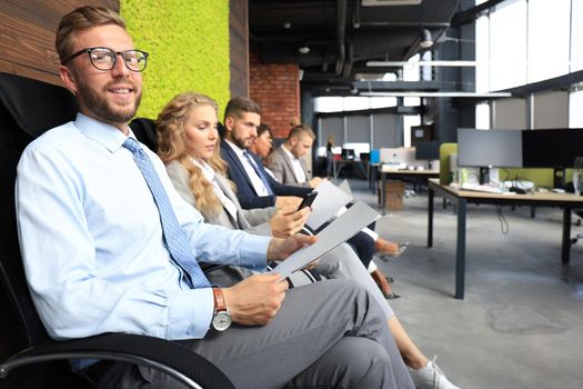 Modern business people waiting for job interview.