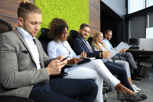 Modern business people waiting for job interview.