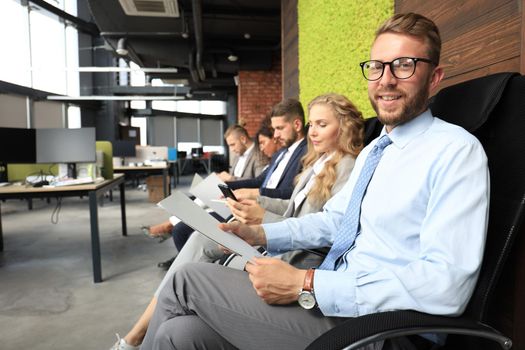 Modern business people waiting for job interview.