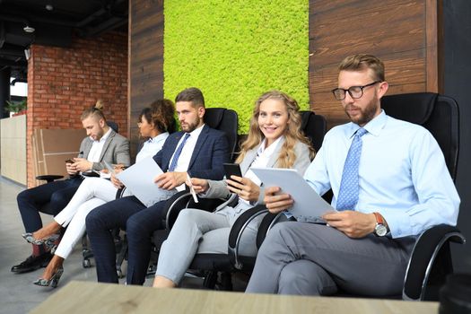 Modern business people waiting for job interview.