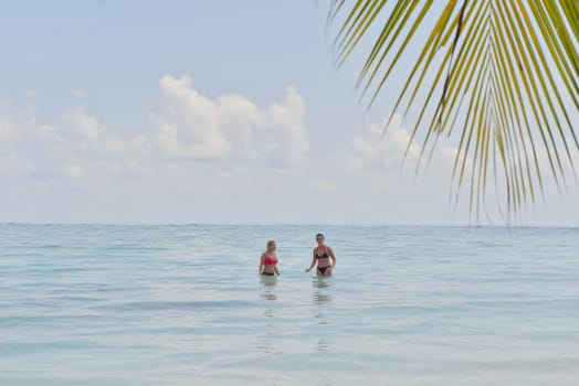 happy young  couple at summer vacation have fun and relax at beautiful sunny  day