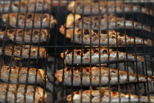 Herring on the grill on a street market