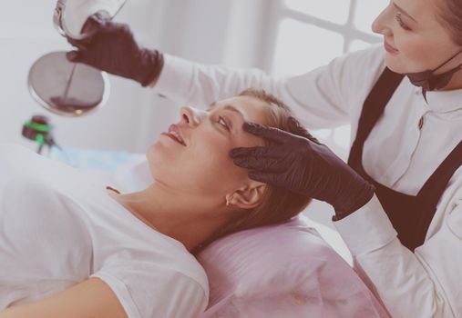 Microblading eyebrows work flow in a beauty salon