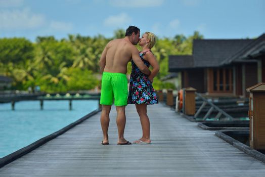 happy young  couple at summer vacation have fun and relax at beautiful sunny  day on beach