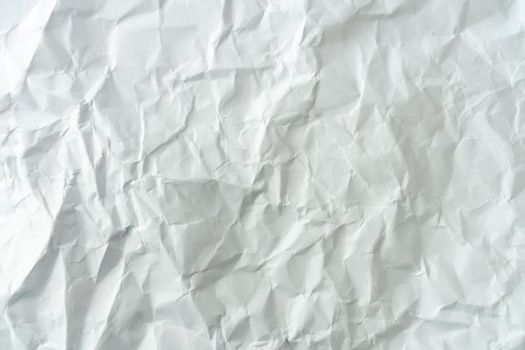 Top view of white crumpled paper texture background.