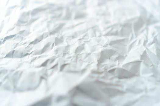 Top view of white crumpled paper texture background.