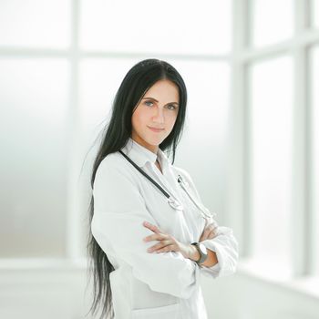 female therapist standing by the hospital window.photo with copy space